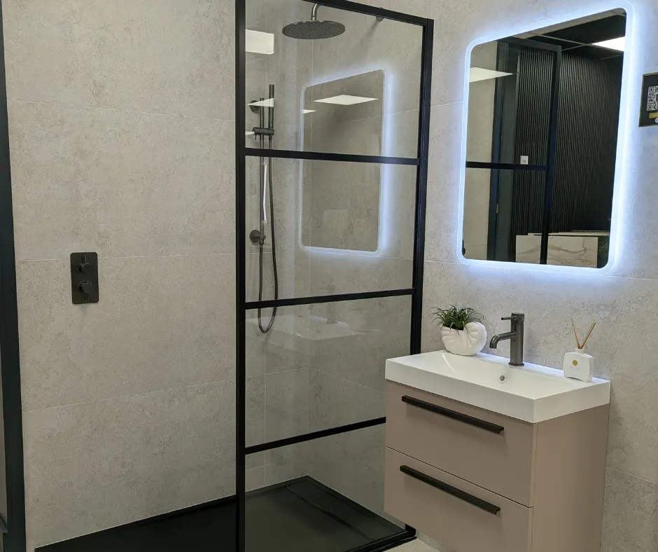 A Modern Design with a Sleek Grey Vanity with Warm Backlighting